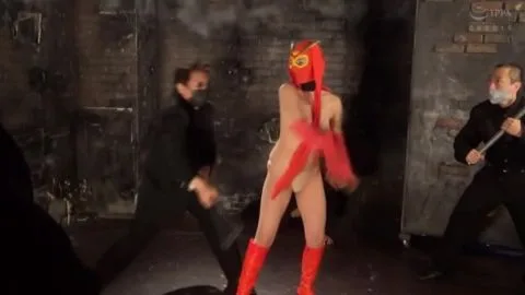 Asian Performers in Red Masks and Leather Gear