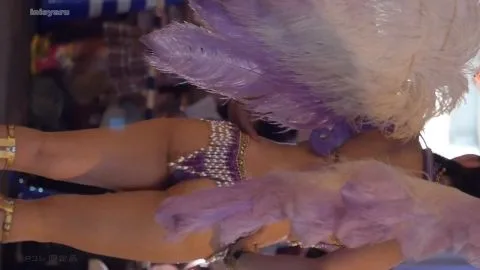 Feathered Dancers in Bikinis