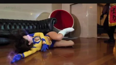 Asian Performers in Costumes Engage in Intimate Scenes