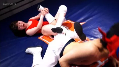 Asian Wrestlers Engage in Intense Matches