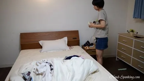 Asian Couple Spanking in Bedroom