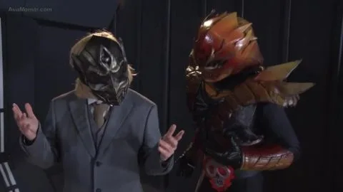 Asian woman in costume struggles with masked men