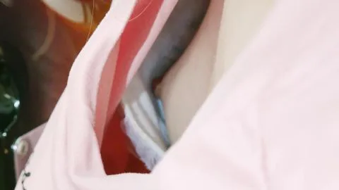 Blonde Asian Woman Exposing Cleavage