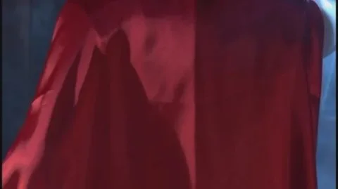 Asian Couple Kissing in Red Masks