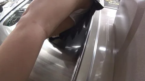 Asian Girl in Short Skirt on Subway Train