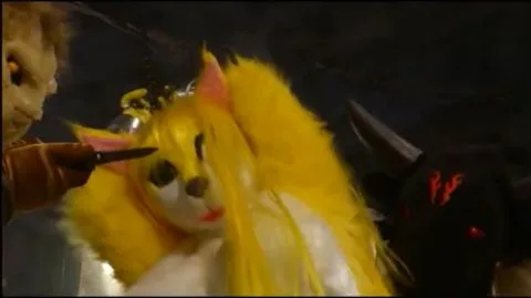 Furry Costume Restraint Scene with Blonde Performer