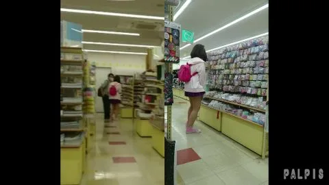 Asian Teens Shopping in Store