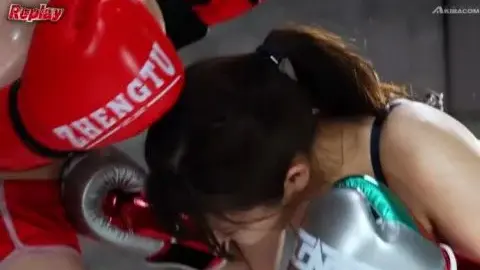 Asian Women Boxing and Kissing