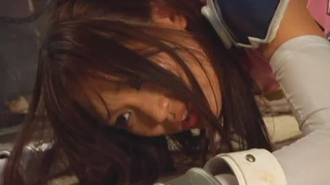 Asian Girl in Pink Outfit and Armor-Like Accessories