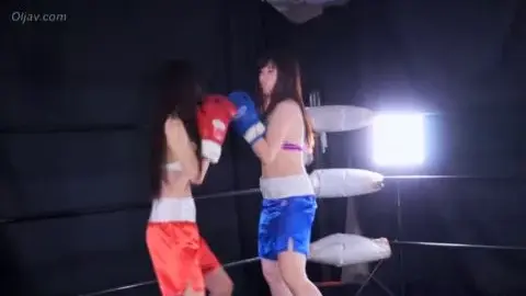 Asian Women Boxing in Ring