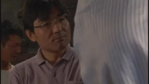 Asian Performers in Costume Armor and Fantasy Outfits