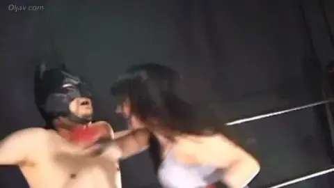 Asian Wrestlers in Mask and Gloves