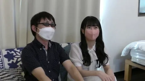 Asian Couple Intimacy on Couch