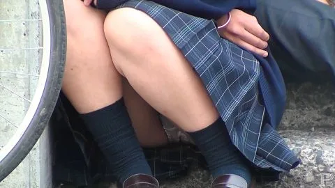 Asian Schoolgirls Intimate Encounter on Stairs