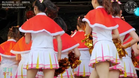 Asian Cheerleaders Dancing in Uniform